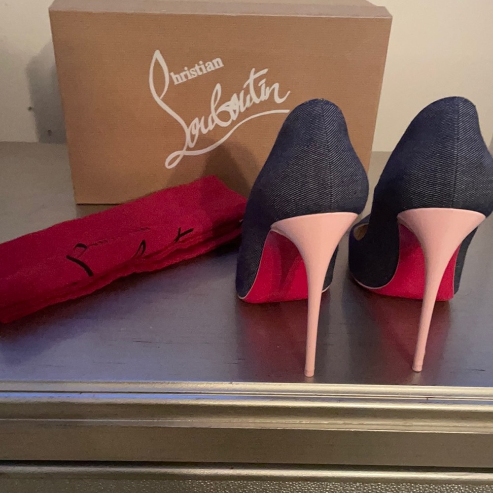 Christian Louboutin denim with pink heels